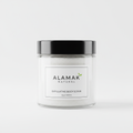 Alamak Natural exfoliating white and creamy body scrub in a clear 8oz jar with black top